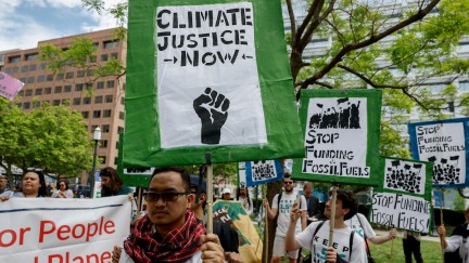 Climate activists march in protest.