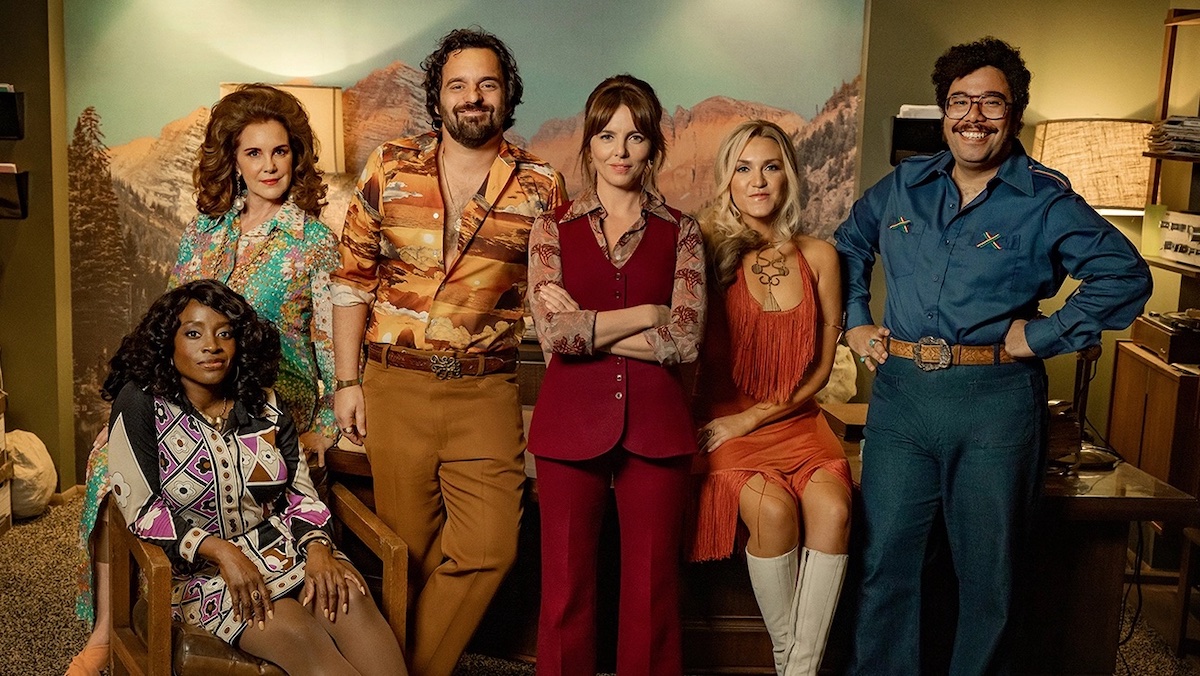The cast of Minx season 2 poses in the Minx office.