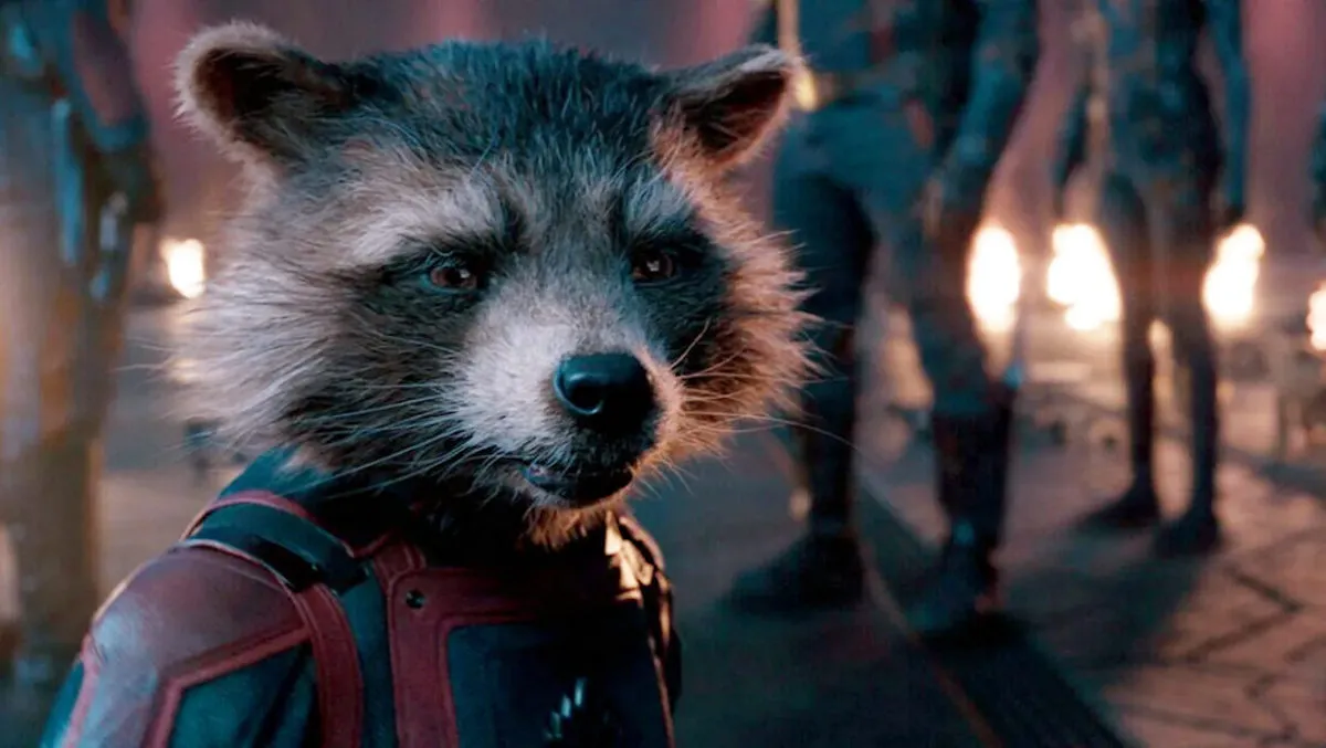 Rocket Raccoon talks to someone off camera in Guardians of the Galaxy Vol. 3.