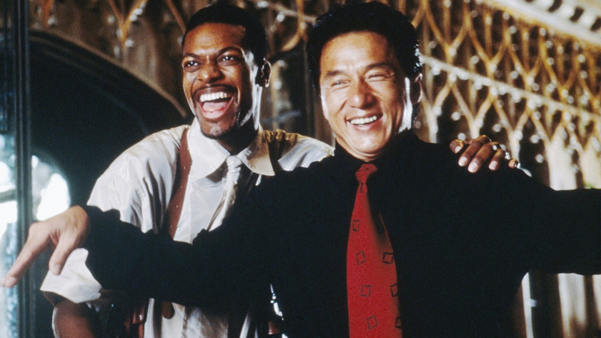 Buddy cops Lee and Carter laughing in with each other in "Rush Hour"