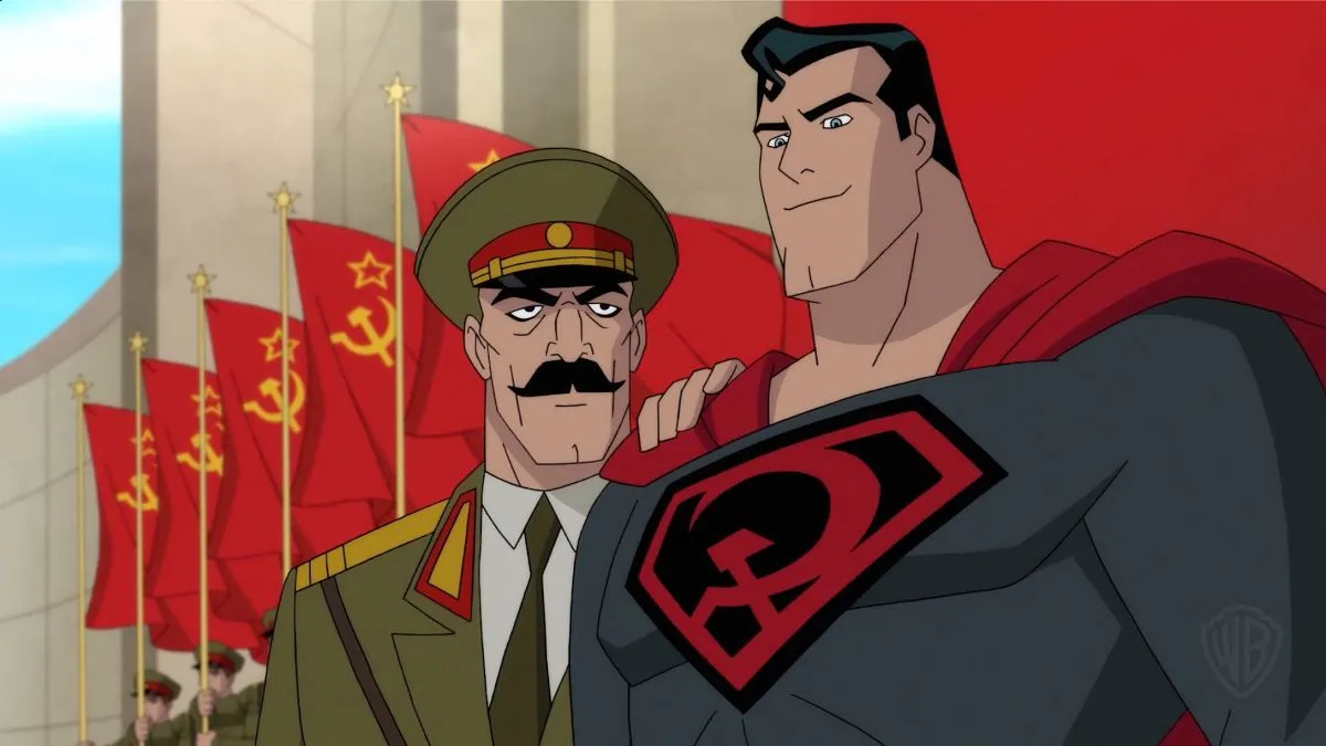 An animated Superman having a conversation with someone in front of USSR flag in "Superman: Red Son"