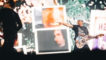 Mark Hoppus and Tom DeLonge of Blink-182 perform onstage.