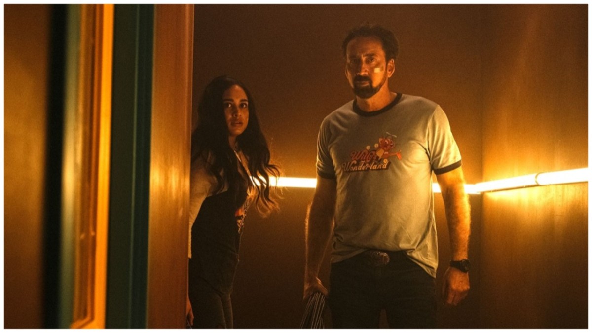 Emily Tosta and Nicolas Cage in 'Willy's Wonderland'.