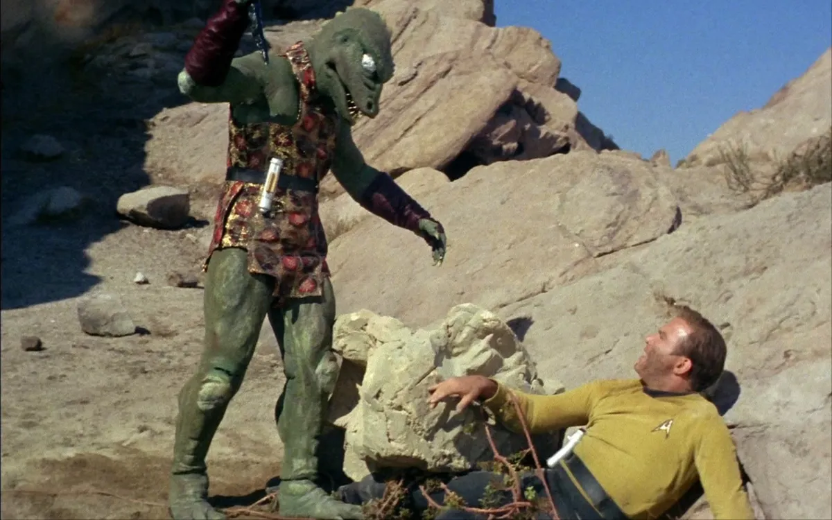 A Gorn, a green lizard-like creature, battles Captain Kirk in 'Star Trek: The Original Series' 