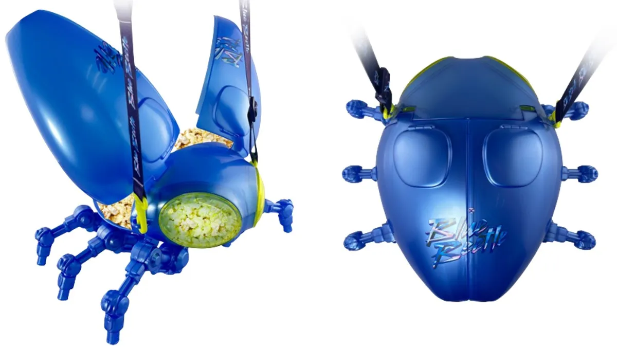 Two shots of Cinemark's Blue Beetle Popcorn Bucket