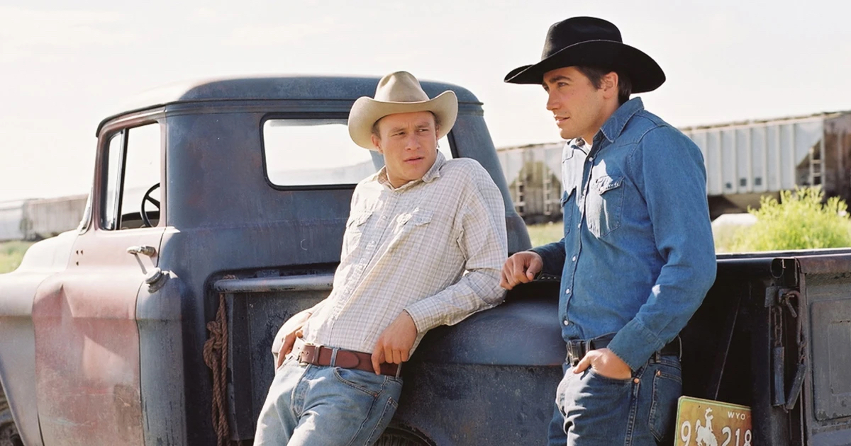 Jake Gyllenhaal and Heath Ledger lean on a truck in "Brokeback Mountain" 