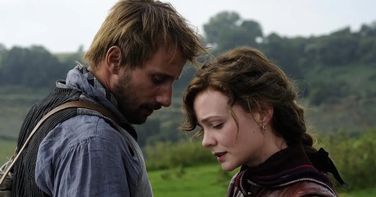 Carey Mulligan and Matthias Schoenaerts sharing an intimate moment in the countryside in "Far from the maddening crowd"