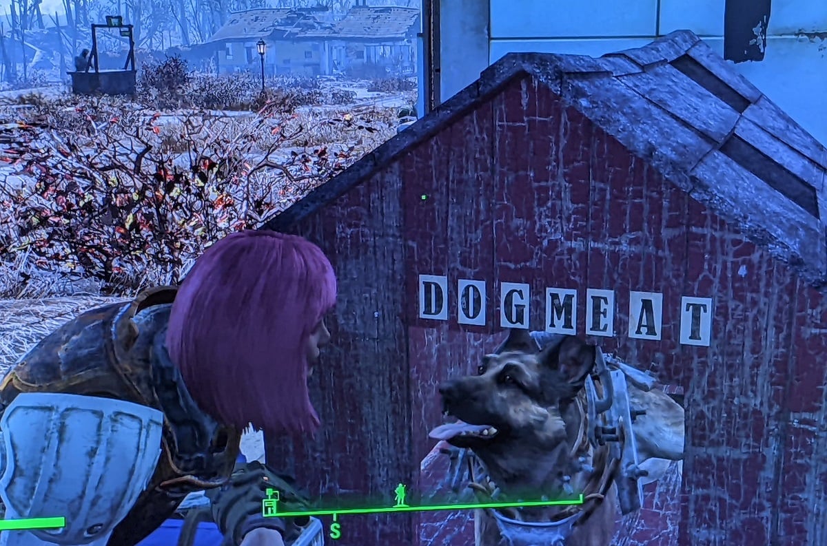 Screencap from the game 'Fallout 4.' Teresa Jusino's female player character wears the Minuteman outfit and body armor, and has brown skin and a pink, chin-length bob. She's on one knee to greet her German Shepherd, Dogmeat, who's sitting in his doghouse wearing metal armor. "DOGMEAT" is spelled out in stuck-on letters above the dog house's doorway.
