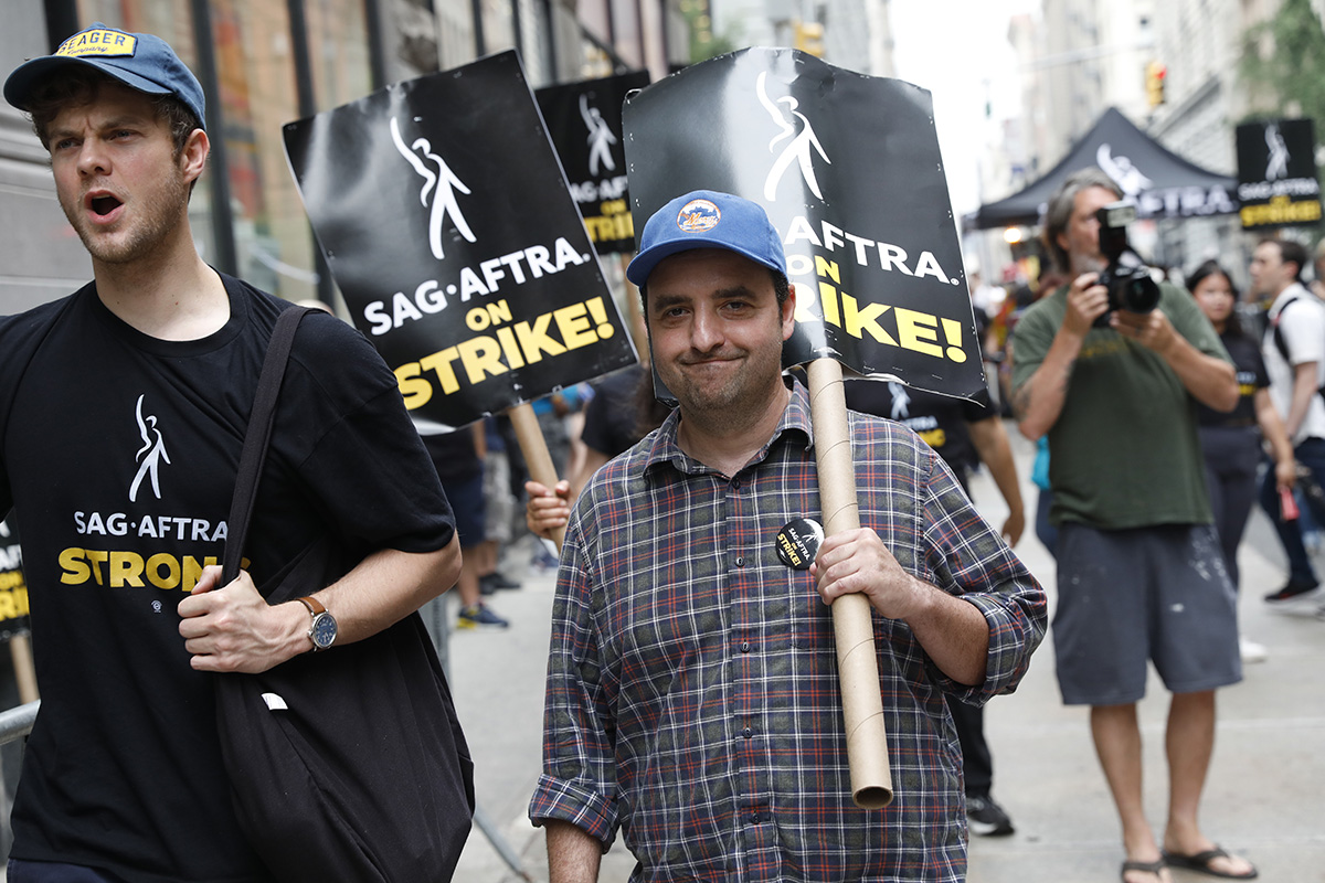 David Krumholtz and Jack Quaid on the picket lines