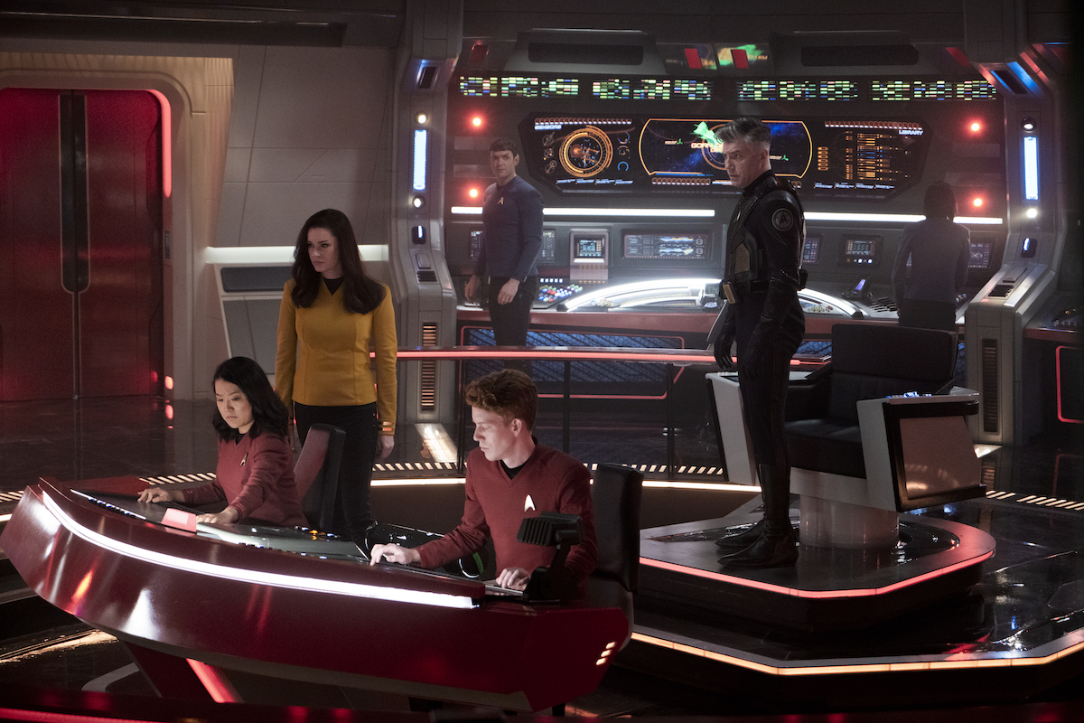 L-R Rong Fu as Mitchell, Rebecca Romijn as Una, Ethan Peck as Spock and Anson Mount as Capt. Pike in Star Trek: Strange New Worlds streaming on Paramount+, 2023.
