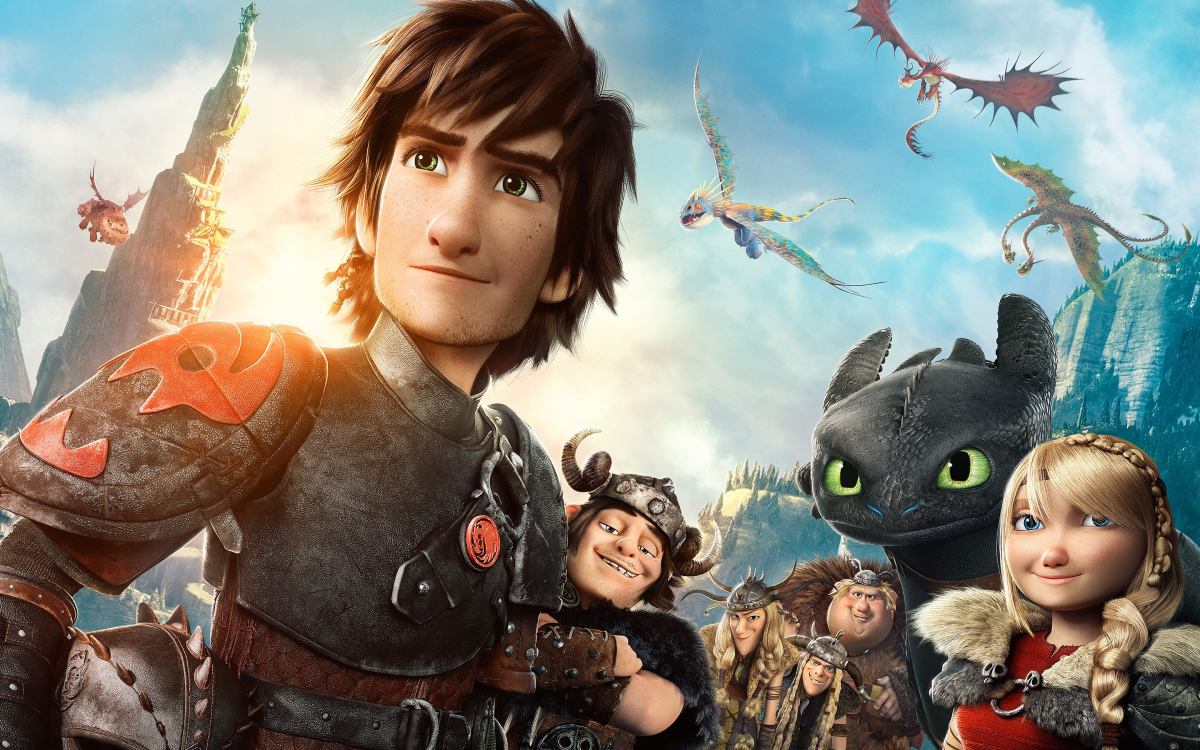 Hiccup and the riders pose with their dragons.