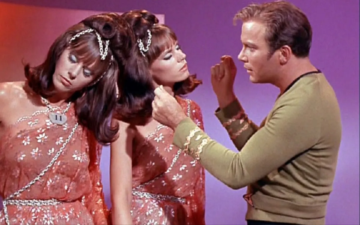 Captain Kirk with two android women in 'Star Trek: The Original Series' 