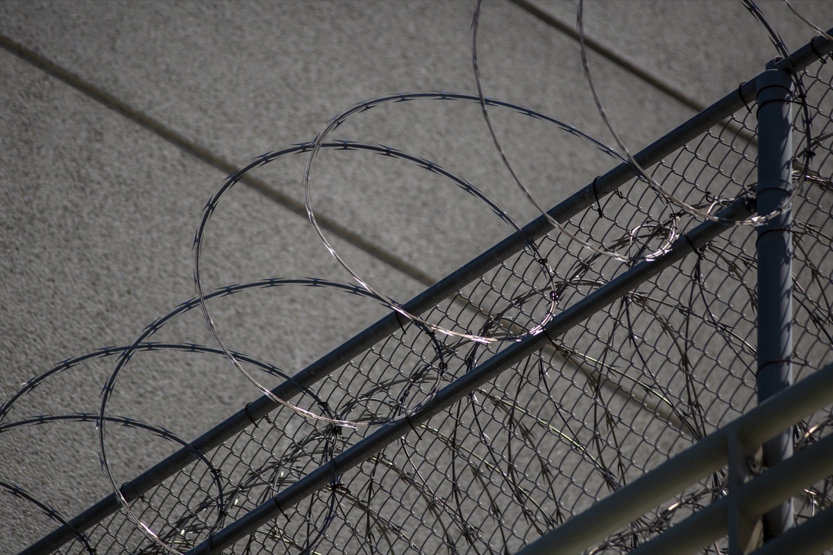 LOS ANGELES, CA - JULY 14: Razor wire is seen on the Metropolitan Detention Center prison as mass arrests by federal immigration authorities, as ordered by the Trump administration, were supposed to begin in major cities across the nation on July 14, 2019 in Los Angeles, California. The U.S. Immigration and Customs Enforcement was expected to be target hundreds of Angelenos for deportation, plus family members and others they encounter and suspect of being undocumented. The city of Los Angeles declared itself a sanctuary city to reflect its policy since the 1970s of not allowing police to help immigration officials because the city wants its immigrant populations to not be afraid to cooperate with police or call in crimes and emergencies. Elected officials and activists have continued to lash out against the raids.   (Photo by David McNew/Getty Images)
