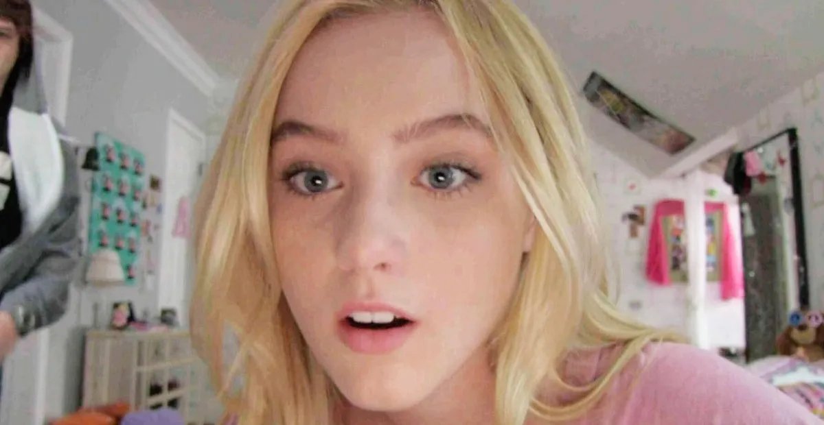 Alex Nelson (Kathryn Newton) looking shocked about some footage in Paranormal Activity 4