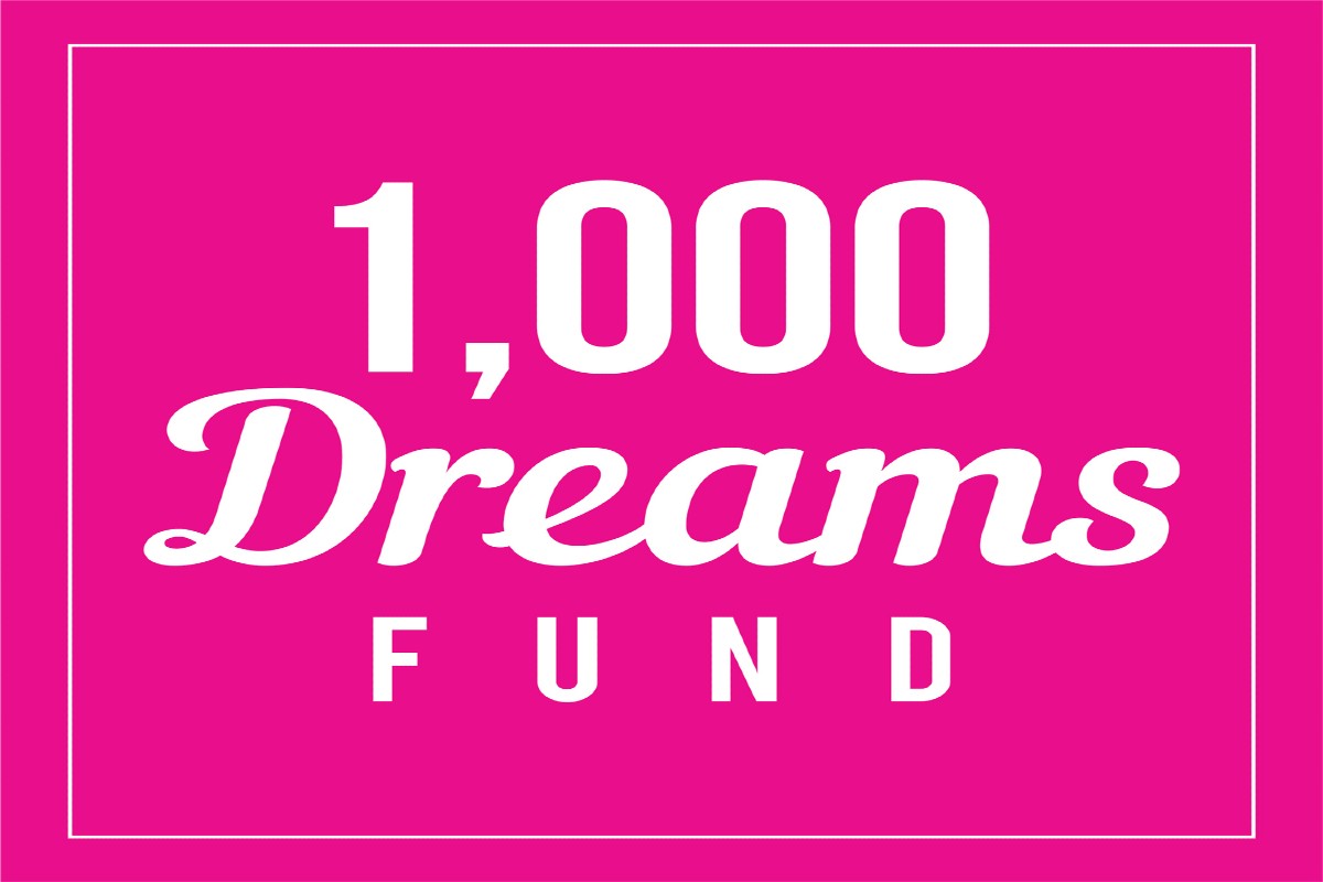 Logo for the 1,000 Dreams Fund: white text on a bright pink background