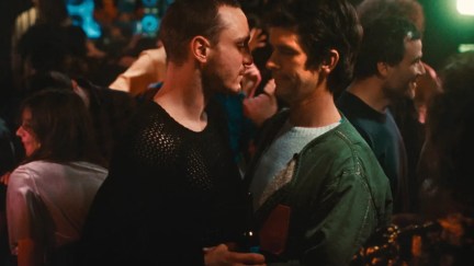 Tomas and Martin having a heated conversation on the dance floor in the film 