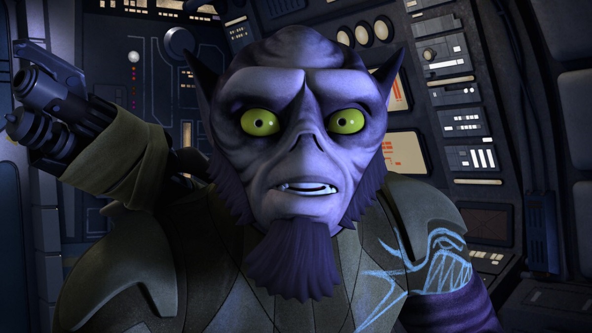 Image of Zeb Orrelios, voiced by Steve Blum, on Disney+'s 'Star Wars: Rebels." He is sitting in a ship cockpit looking at something wide-eyed and worried.