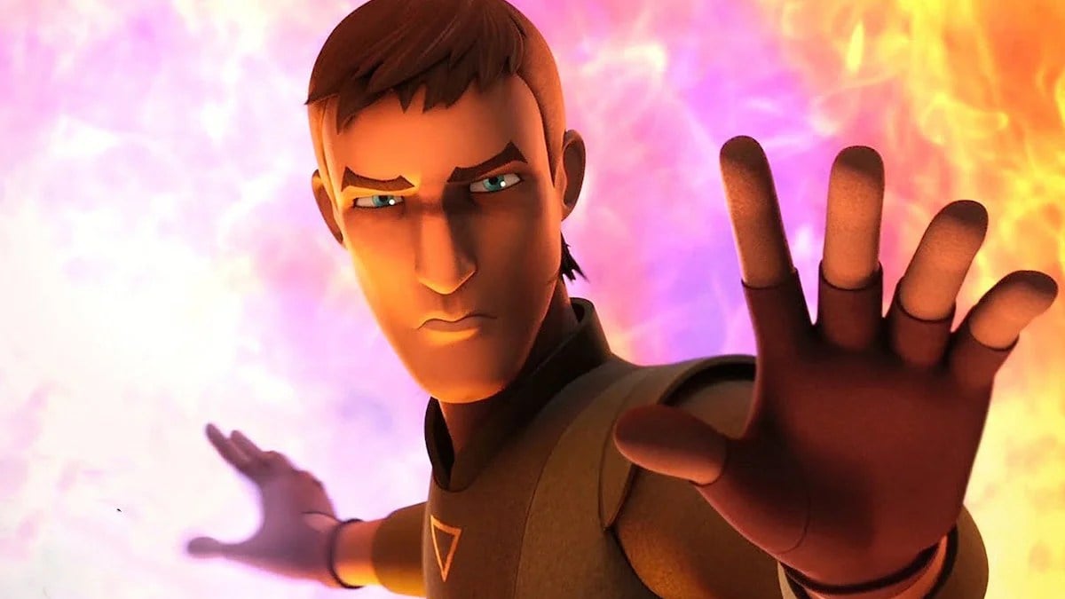 Image of Kanan Jarrus, voiced by Freddie Prinze Jr, on Disney+'s 'Star Wars: Rebels." He is holding out his hands using the Force to keep a fire at bay with one hand while using it to keep people away with the other.
