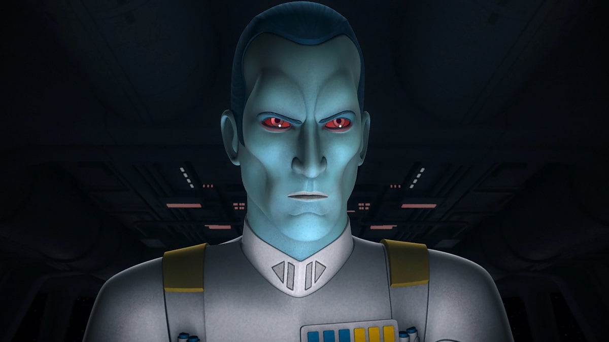 Image of Thrawn, voiced by Lars Mikkelsen, on Disney+'s 'Star Wars: Rebels." He is looking intently at something in a dark room.