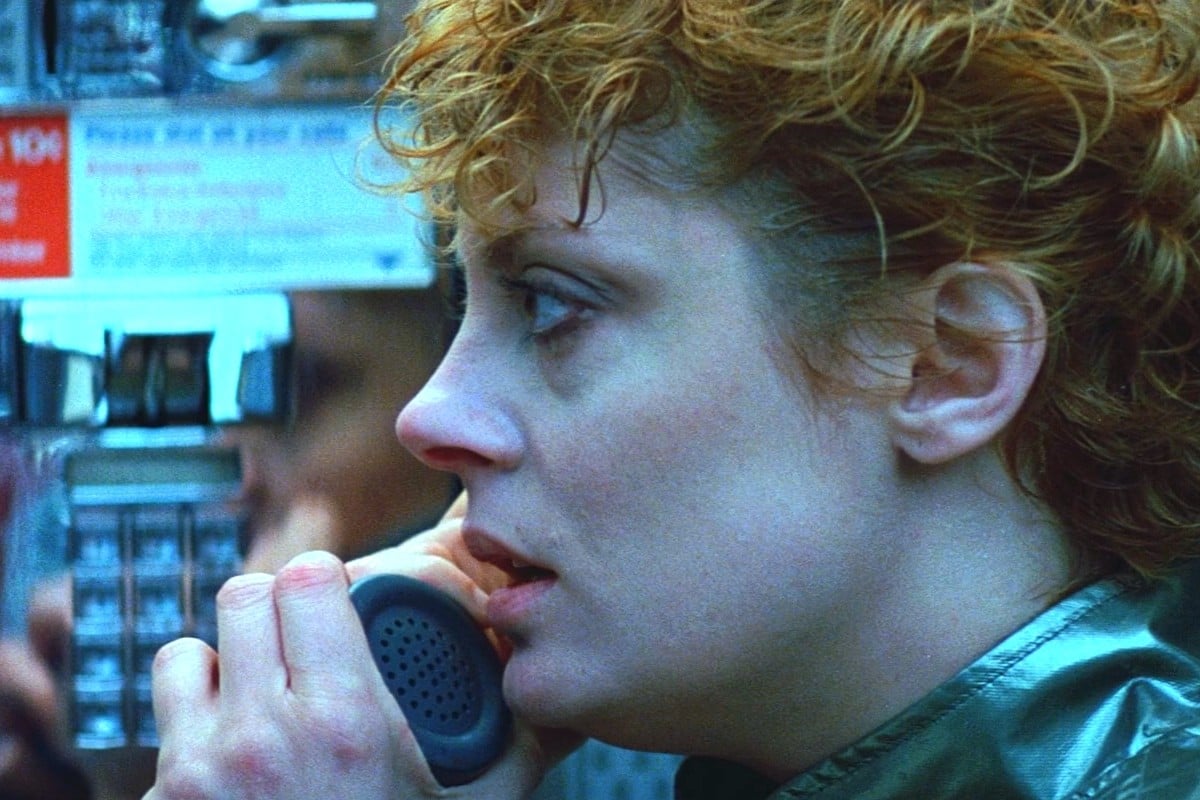 A woman named Sarah Roberts (Susan Sarandon) using a payphone in "The Hunger" in "The Hunger"
