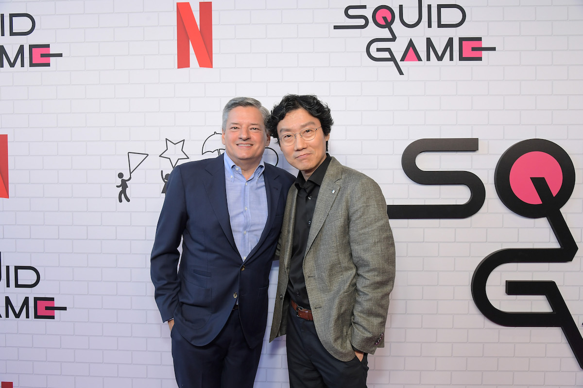 Netflix Ted Sarandos and Squid Game director Hwang Dong-hyuk on a red carpet