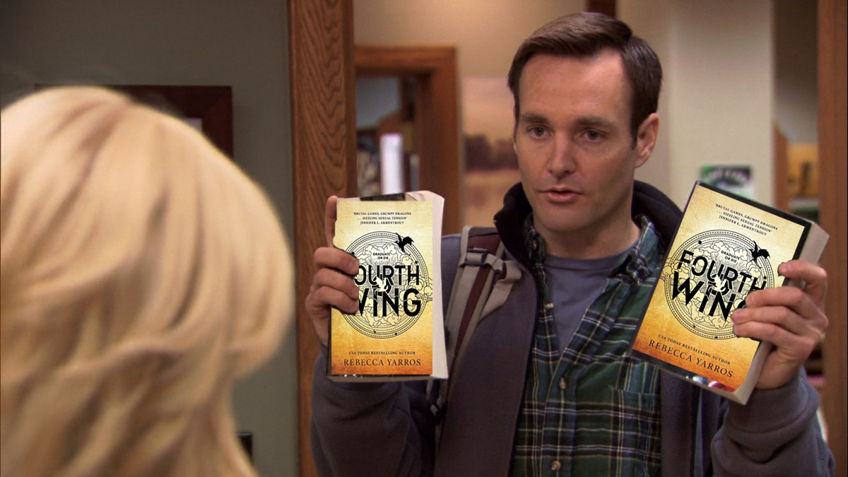 Will Forte in Parks and Rec holding Photoshopped Fourth Wing books.