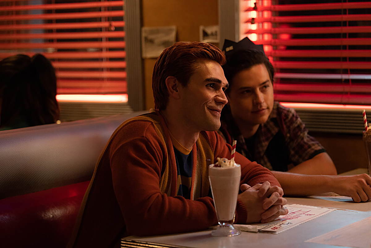 Riverdale -- “Chapter One Hundred Thirty-Seven: Goodbye, Riverdale” -- Image Number: RVD720b_0163r -- Pictured (L - R): KJ Apa as Archie Andrews and Cole Sprouse as Jughead Jones -- Photo: Justine Yeung/The CW -- © 2023 The CW Network, LLC. All Rights Reserved.
