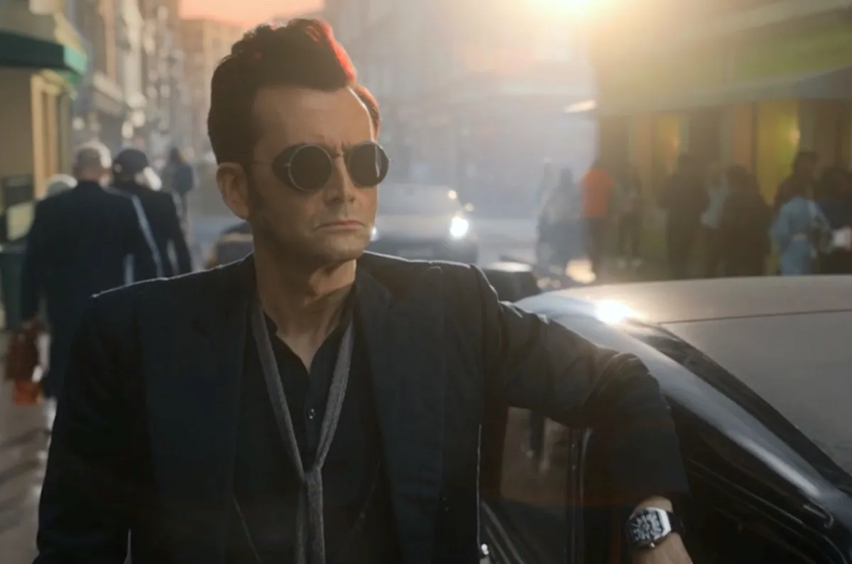 David Tennant waits with the Bentley as Crowley in Good Omens 2