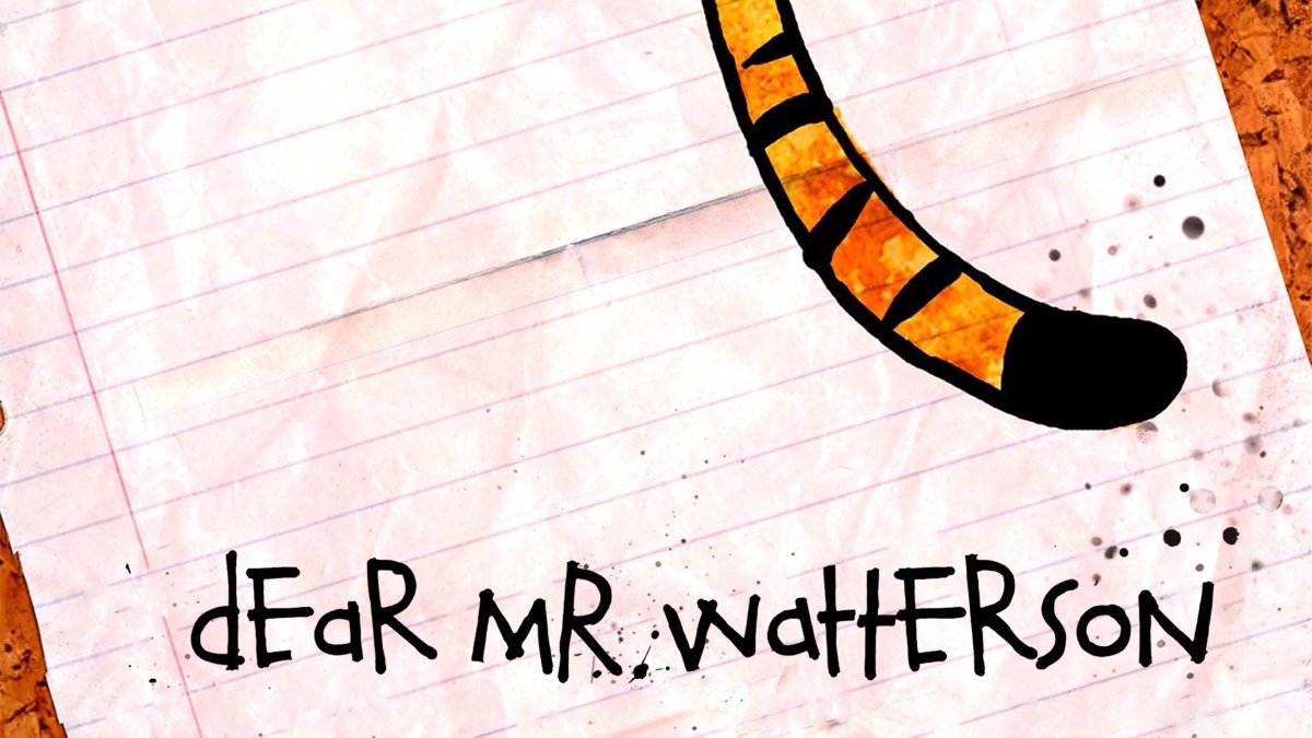 An animated tiger tail rests on a sheet of white lined paper