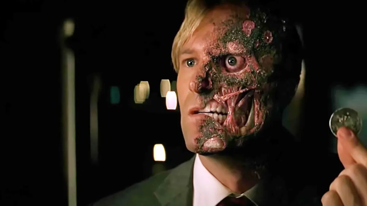 Harvey Dent with his coin from 'The Dark Knight'