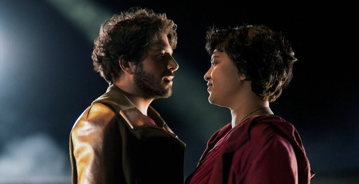 Hober and Brother Constant stand face to face in Foundation. They look like they're about to kiss.