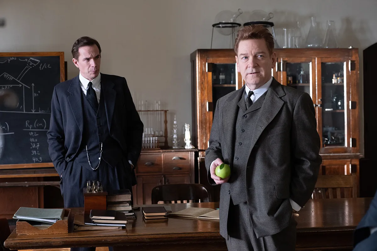 Kenneth Branagh with an apple in Oppenheimer
