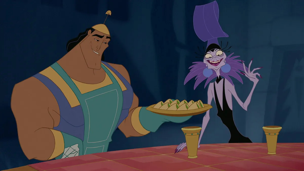An animated Kronk from "The Emperor's New Groove" offering Yzma something to eat.