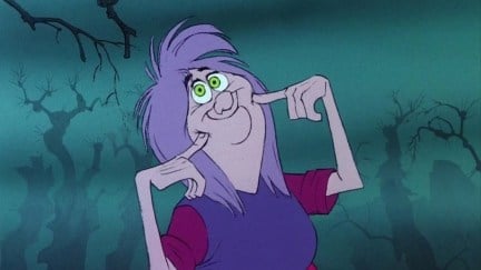 The animated character Madam Mim gives a fake innocent smile.