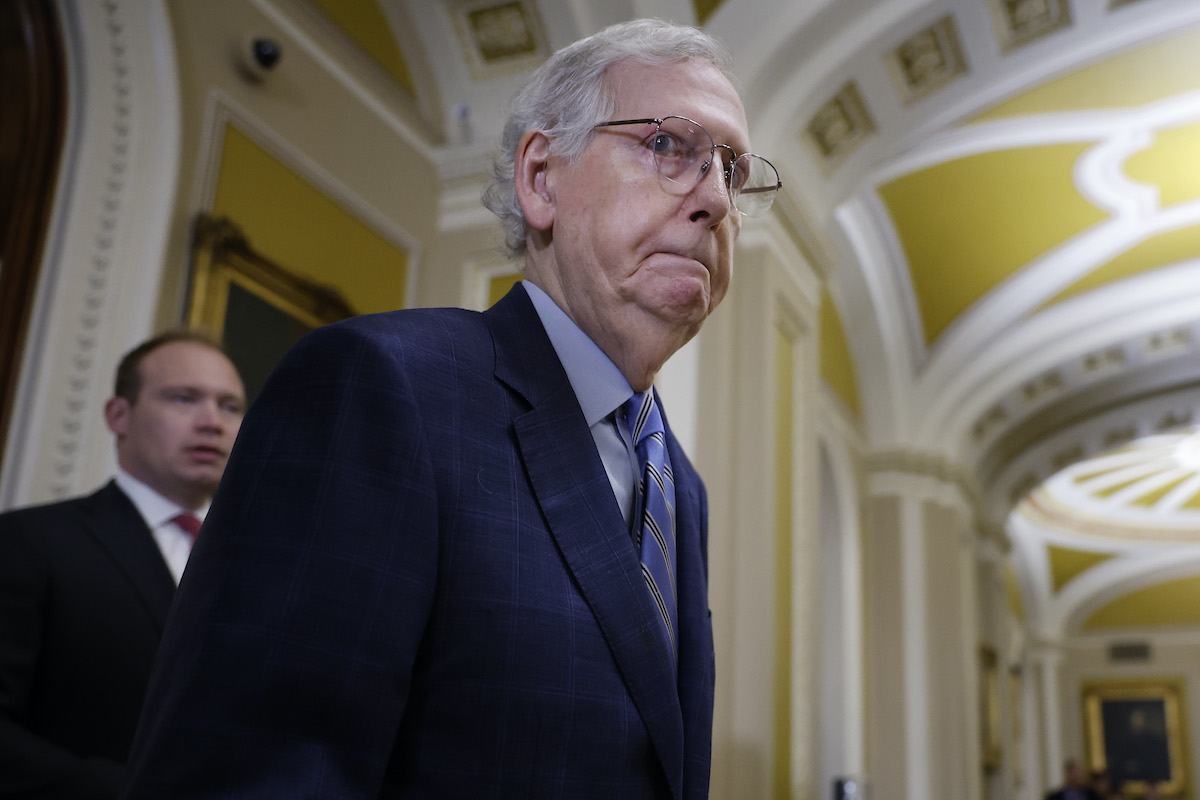 Mitch McConnell looks stunned in the Capitol building