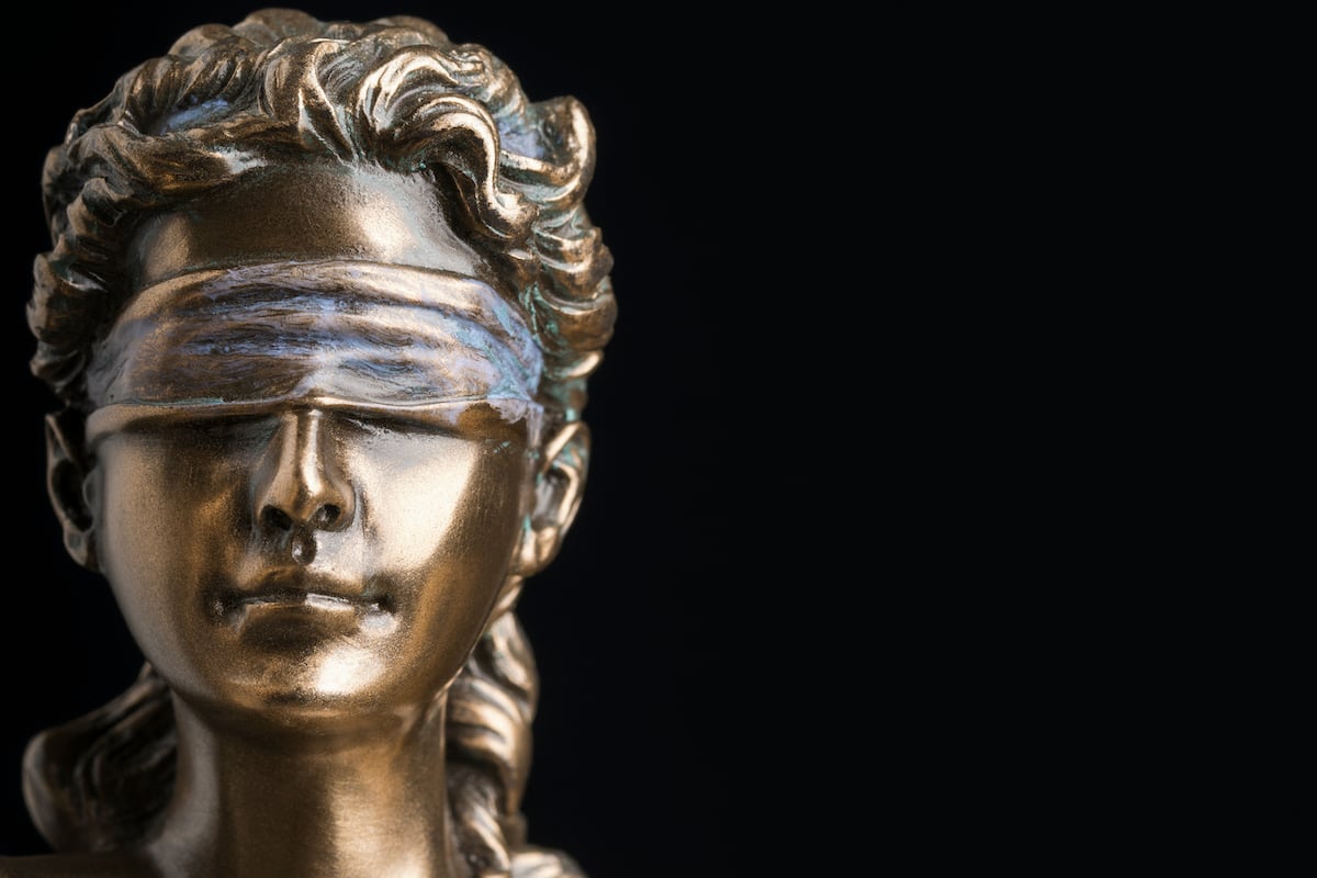 Portrait of the blindfolded goddess of justice
