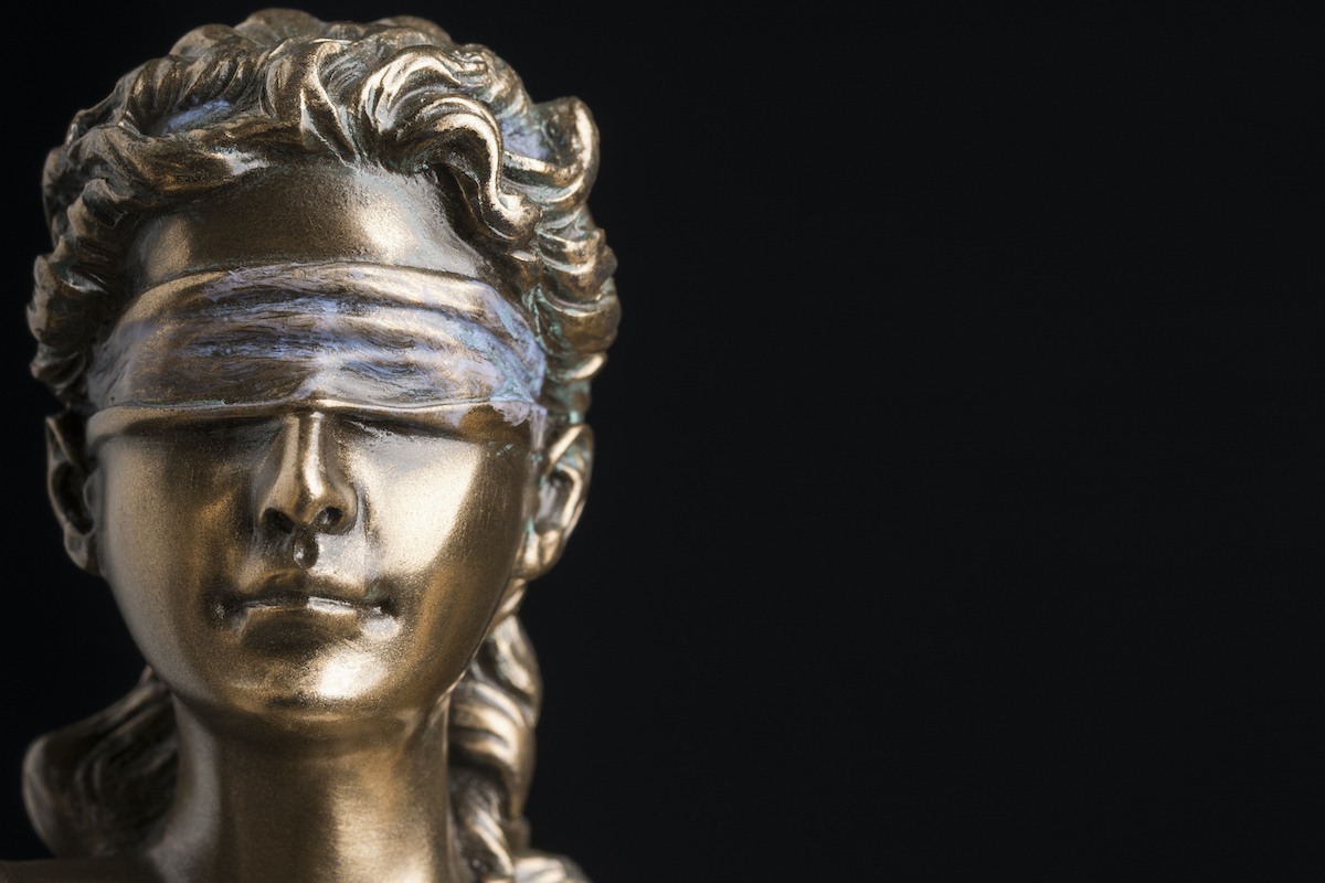 Portrait of the blindfolded goddess of justice