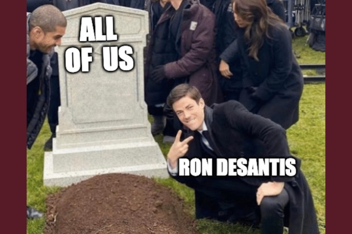 The meme of Grant Gustin (labeled Ron DeSantis) flashing a peace sign over a grave (labeled "all of us")