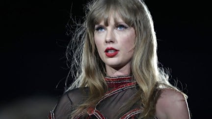 Taylor Swift performs onstage during Taylor Swift | The Eras Tour at Levi's Stadium on July 28, 2023 in Santa Clara, California. She looks a bit unsure.