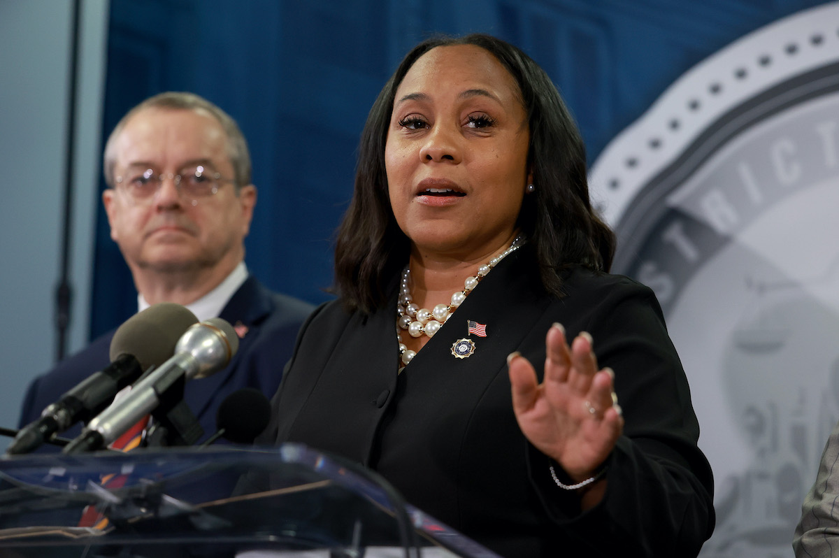 Fulton County District Attorney Fani Willis speaks during a news conference