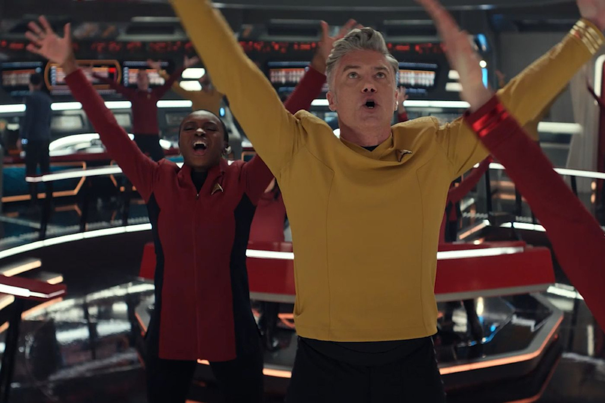 Captain Pike and the crew of the Enterprise sing and dance in the musical "Subspace Rhapsody" episode of 'Star Trek: Strange New Worlds'