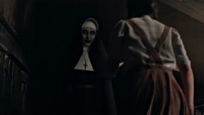 Valak the Demon (Bonnie Aarons) takes the form of a nun and frightens a French schoolgirl in ‘The Nun II.’