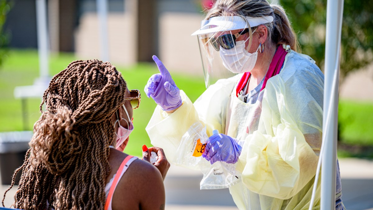 A woman gets a COVID test in North Carolina. Public domain.
