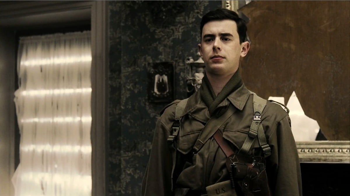 Young white male solider stands at attention in 'Band of Brothers.'