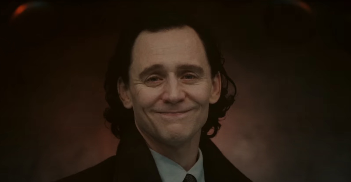 A picture of Loki smiling tightly, as if posing for an awkward portrait.