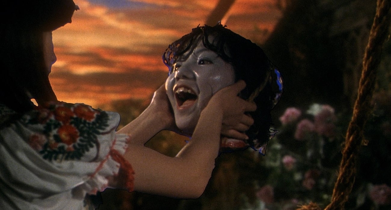 High schooler Fantasy (Kumiko Oba) holds the taunting severed head of her friend Mac (Mieko Sato) in ‘House.’ 