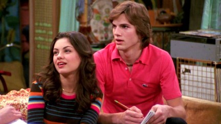 Mila Kunis as Jackie Burkhart and Ahston Kutcher as Michael Kelso in That 70s Show