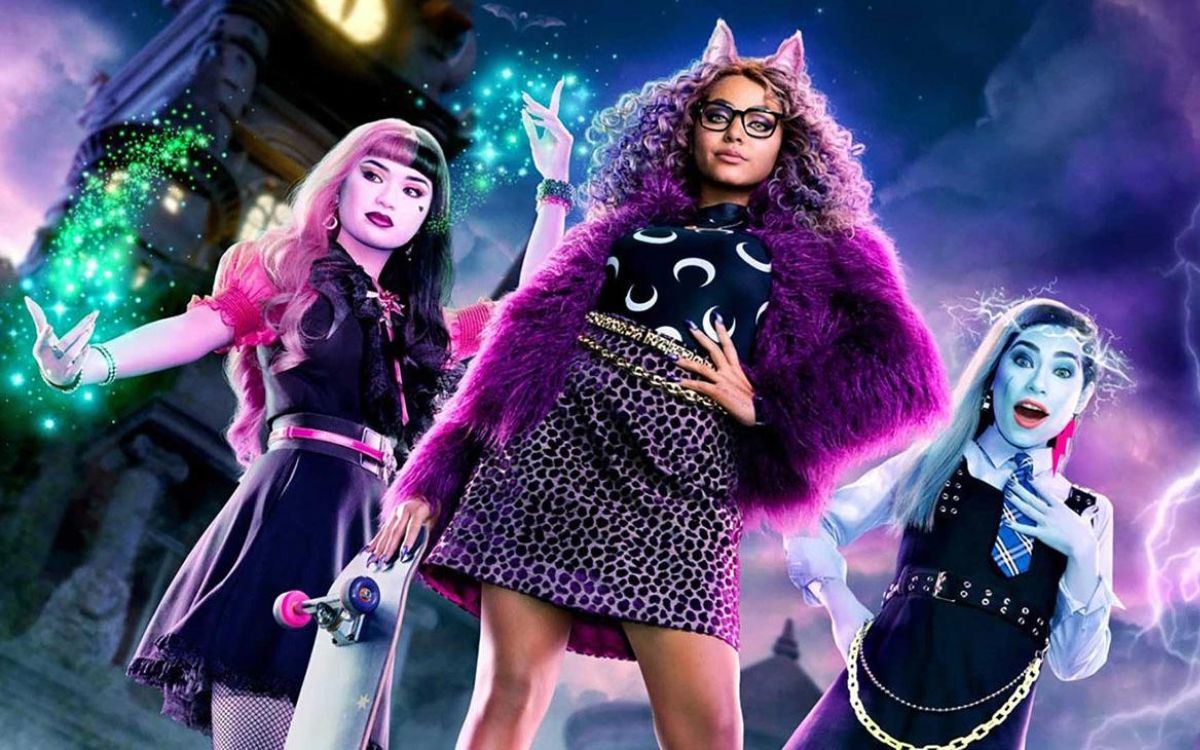 Three girls as modern monsters stand and stare into the camera in "Monster High: The Movie"