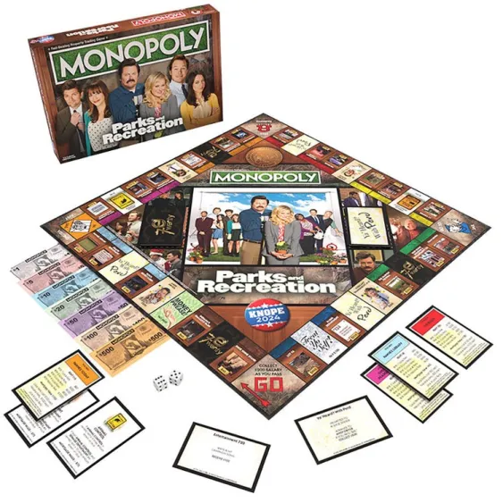 Monopoly board game showing all pieces and cards. 