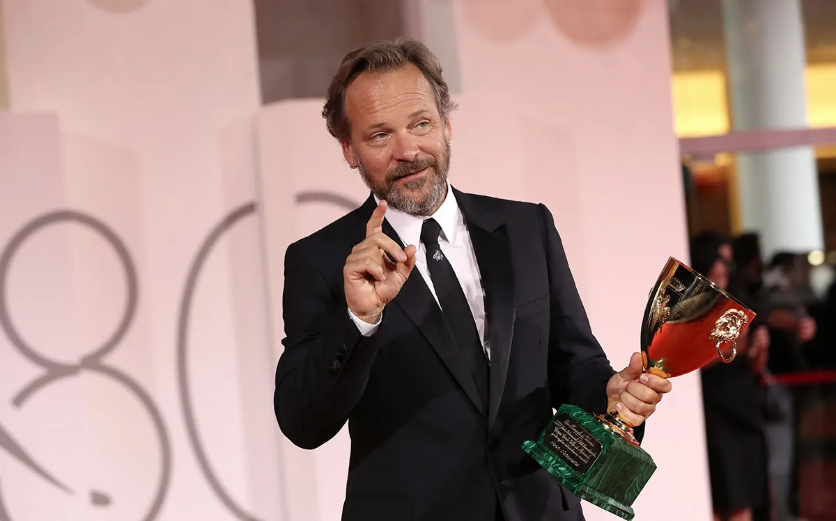 VENICE, ITALY - SEPTEMBER 09: Peter Sarsgaard poses with the Best Actor Award for 'Memory' at the winner's photocall at the 80th Venice International Film Festival on September 09, 2023 in Venice, Italy. (Photo by Elisabetta A. Villa/Getty Images)